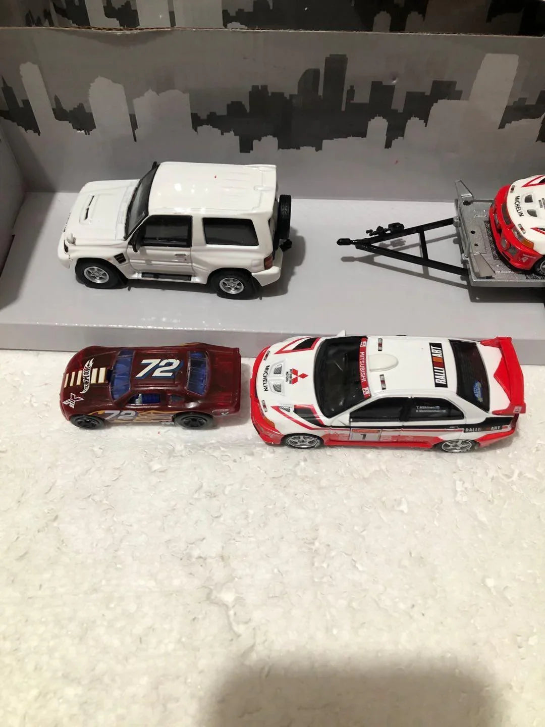 1:43 Mitsubishi Pajero with short axle trailer and Mitsubishi Evo V