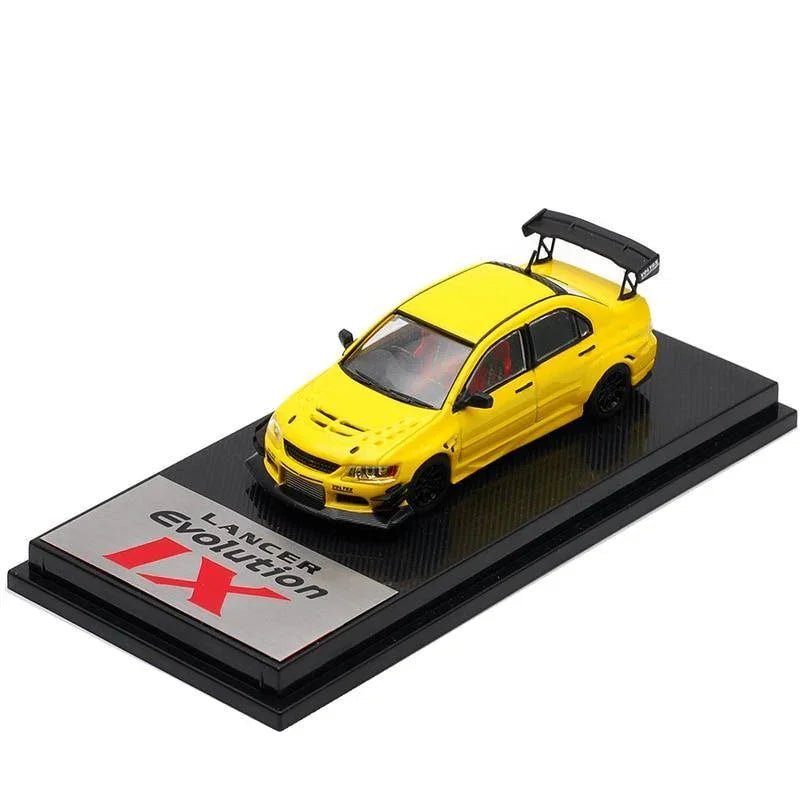 1:64 Voltex Mitsubishi Lancer Evolution IX yellow model car