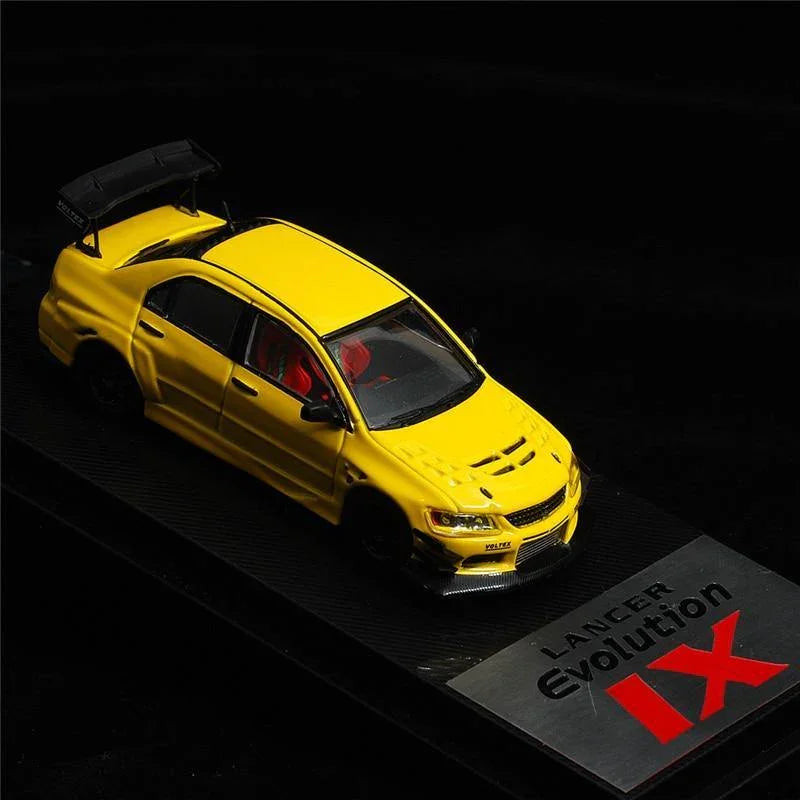 1:64 Voltex Mitsubishi Lancer Evolution IX yellow model car
