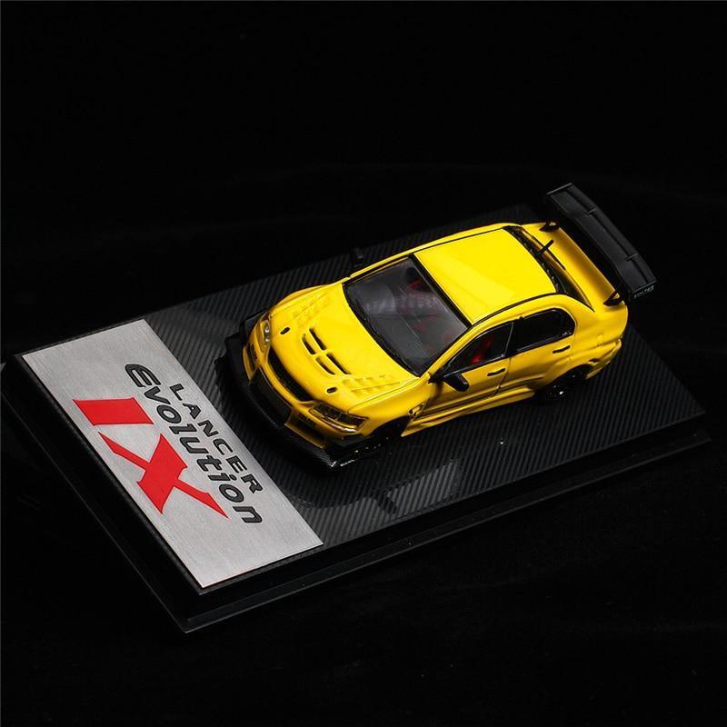 1:64 Voltex Mitsubishi Lancer Evolution IX yellow model car